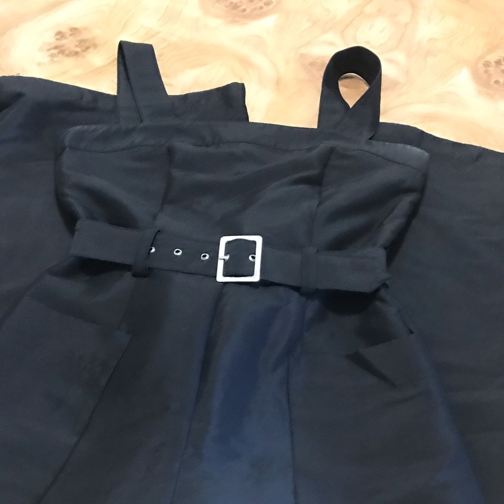 Navy blue wide legged jumpsuit with belt